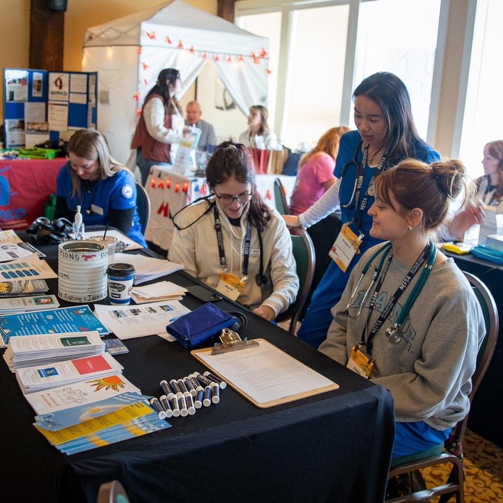USM nursing grad students helping patients at events like the annual Fisherman's Forum.