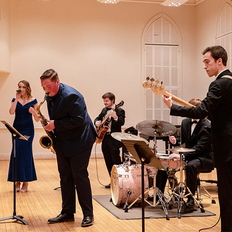 Five jazz musicians play together in Corthell Hall.