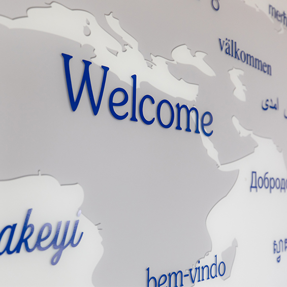 A map of the world with the word 'Welcome' written in different languages.