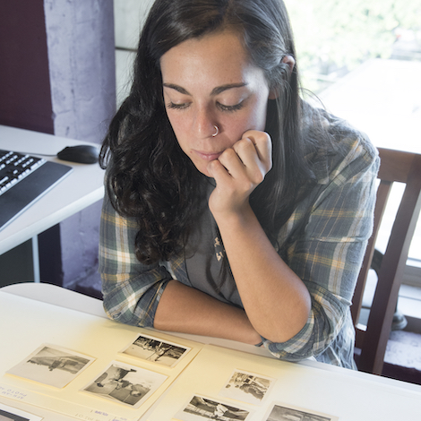 A student looks at old photos.