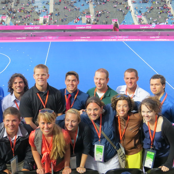 A group of USM sports management students stand in a stadium in London.