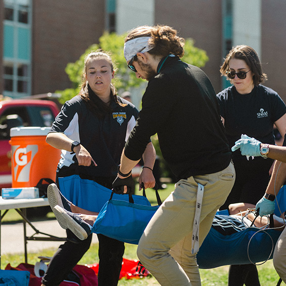 Athletic Training students practice skills during a mock injury simulation.