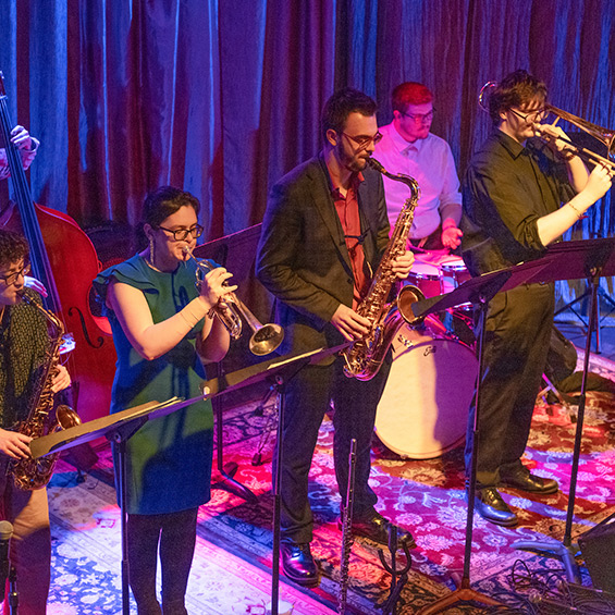 The Jazz Ensemble performs on a stage in Portland.