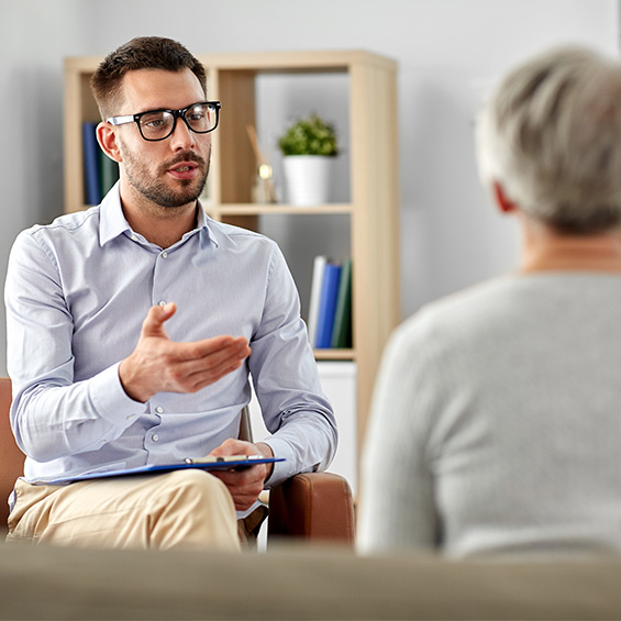 A counselor has an individual session with a patient.