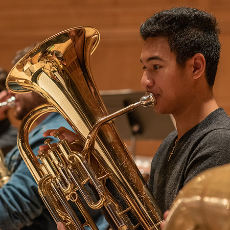 A student plays the trumpet.
