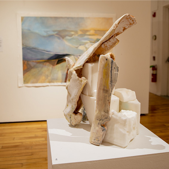 A sculpture and painting in the USM Art Gallery BFA/BA exhibition.