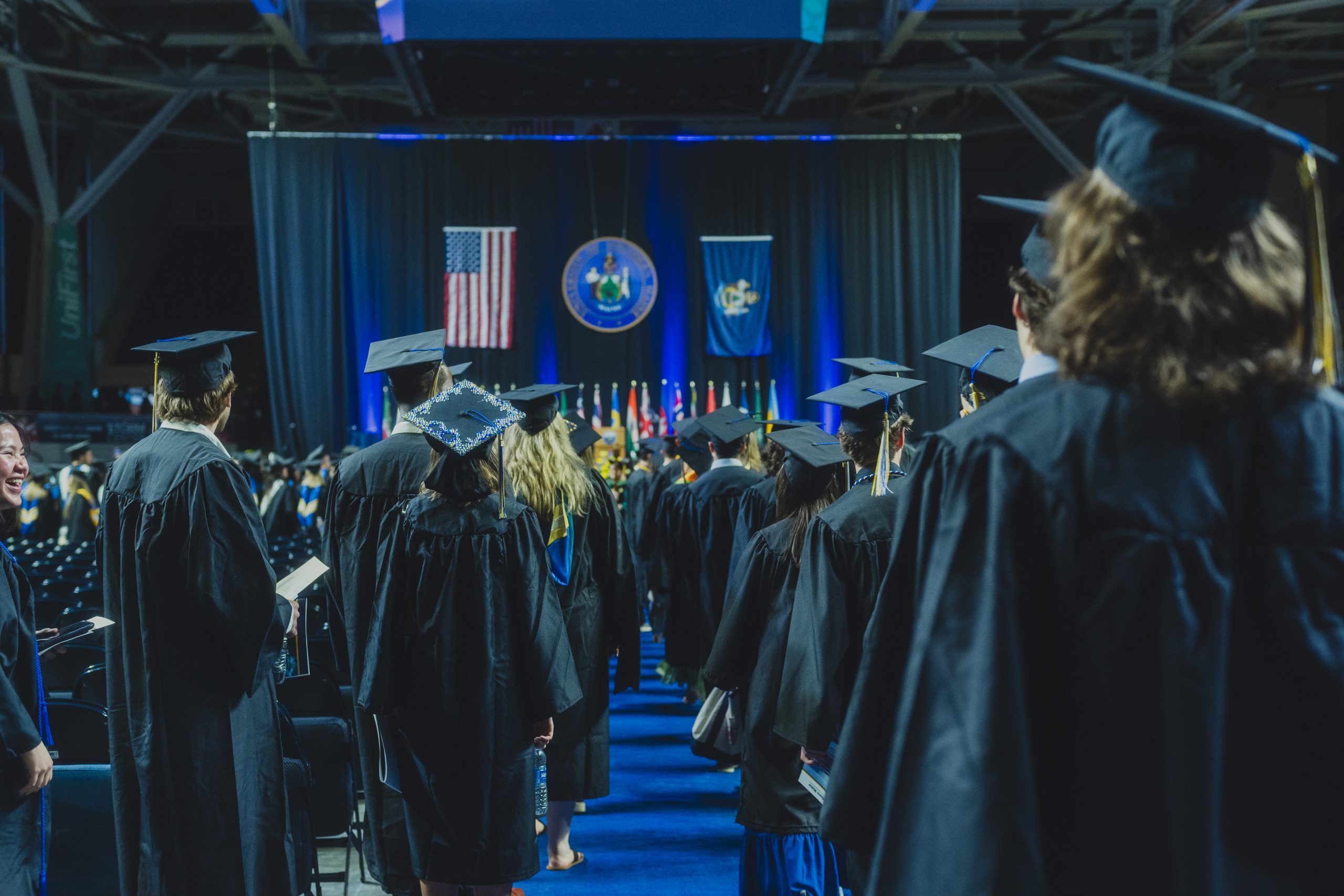 Students lining up to receive diplomas at USM's 2025 Commencement Ceremony.