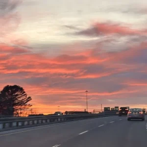 charlotte_driving_pretty_sky