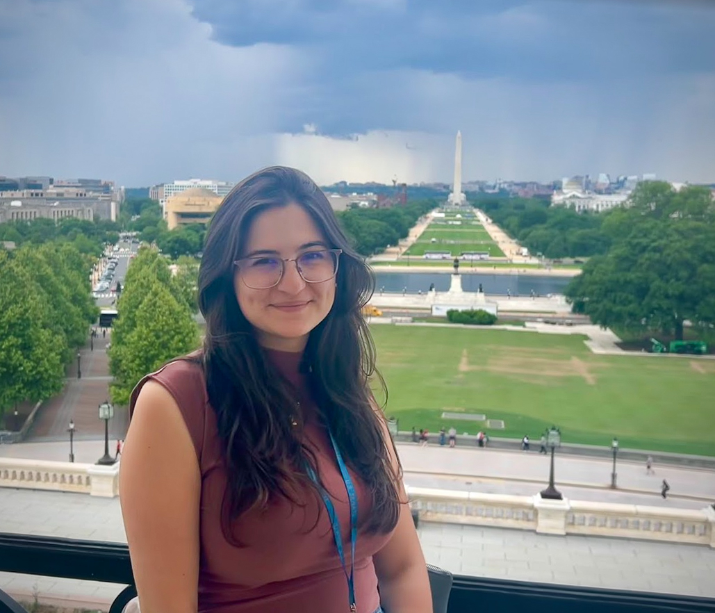 USM political science student Emma stands in front of the Washington Monument during a Model UN conference in Washington, DC