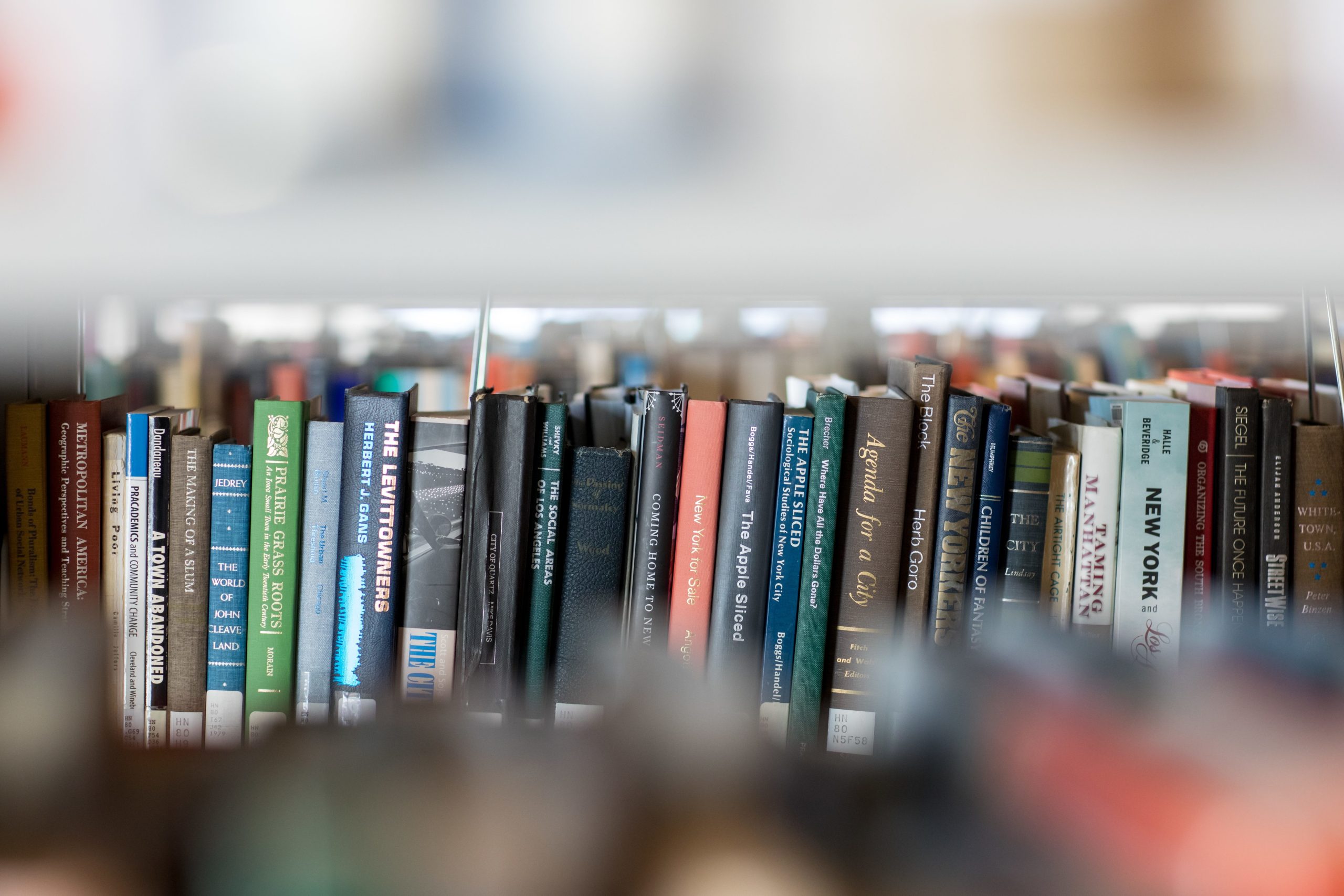 University of Southern Maine interior of Glickman Library books on bookshelves.