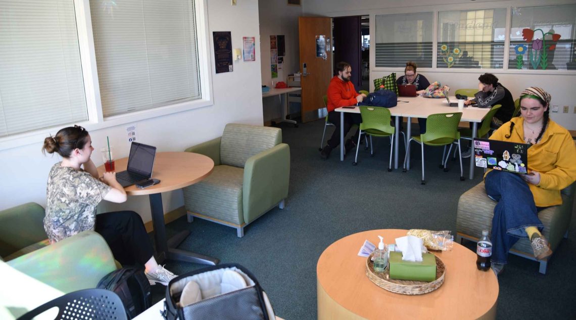 Adult learners studying in the Adult Student Success Center in the Glickman Family Library.