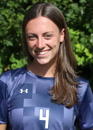 Bridgette Toland smiles in her soccer uniform.