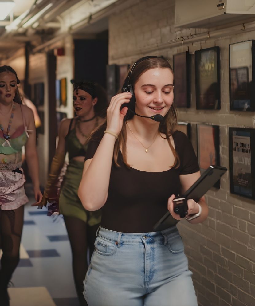 Production stage manager Hannah Gravelle coordinates 2026 spring musical, Cabaret from back stage.
