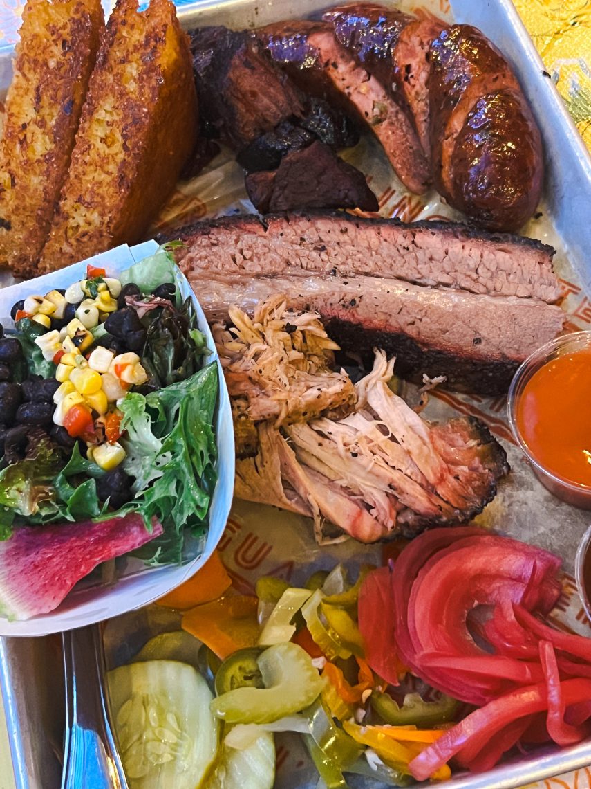 A close-up of barbecue meats and salad from Terlingua in Portland, Maine.
