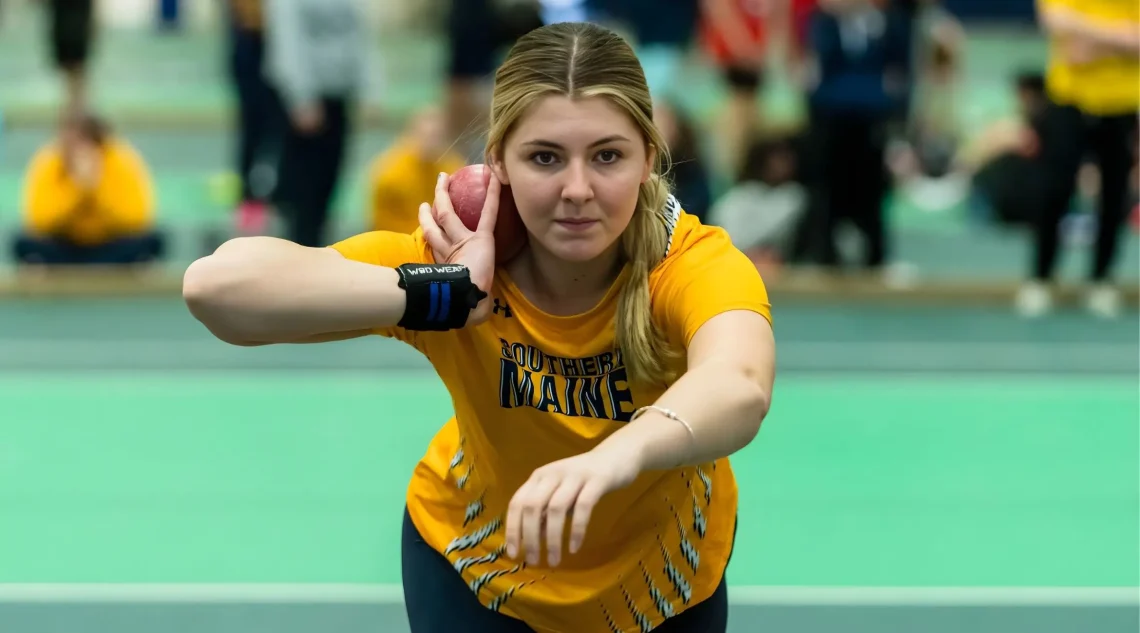 Zoe Barnes focuses before throwing shot put.