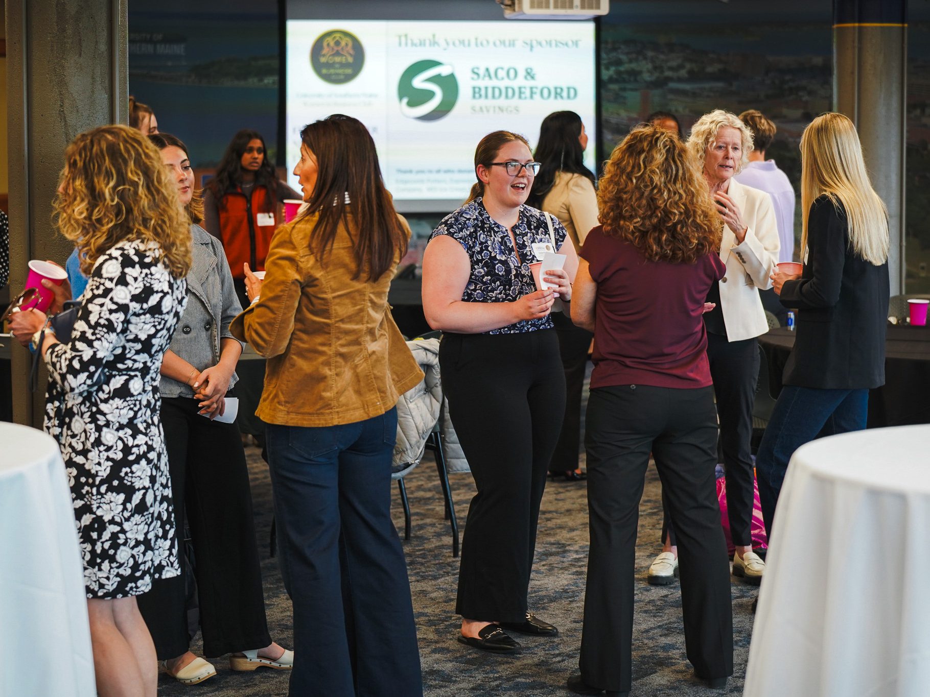 Students and industry professionals mingle at a University of Southern Maine Women in Business Club networking event, sponsored by Saco and Biddeford Savings.