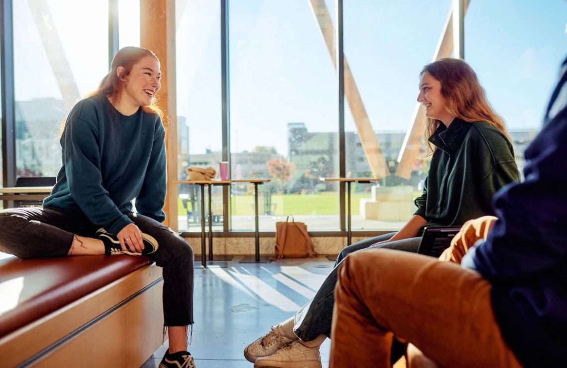 Students talking in the McGoldrick Student Center