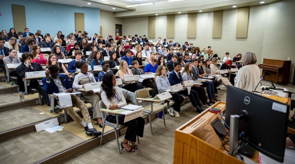 Delegates gathered in the lecture hall for presentations on foreign affairs.