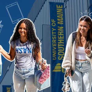 Students placed over top USM backdrop with graphics of various first day of school need.