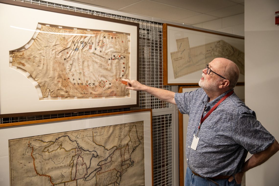Matthew Edney describing details of the Portolan Chart of the Mediterranean Region, printed on sheepskin.