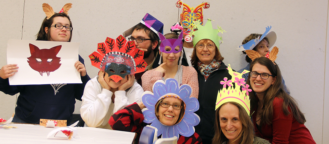 Rebeca Goodale and Book Arts Students wearing handmade Party Hats