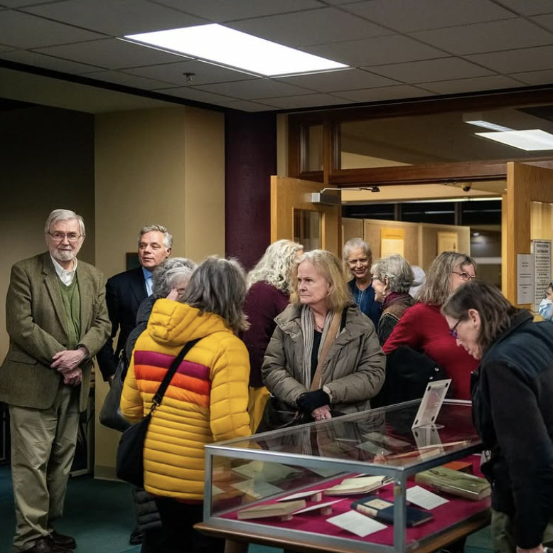 Photograph of the opening reception for Reid Byers' Imaginary Books exhibit, at the Glickman Family Library