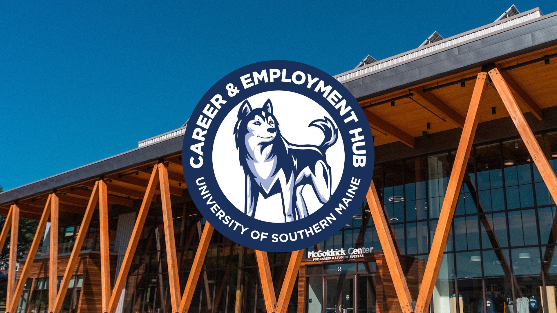 Career & Employment Hub graphic with a background of the front of the McGoldrick Center.