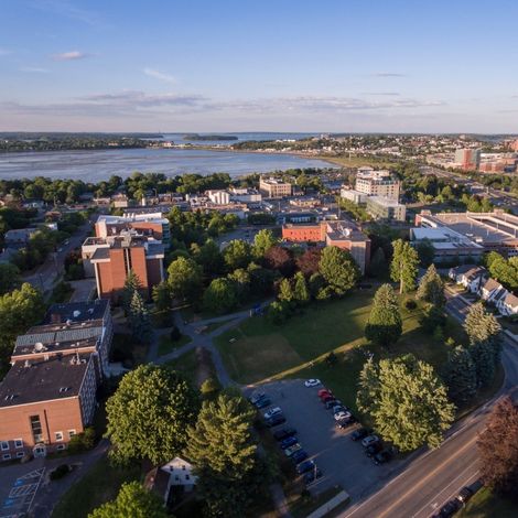 Aerial view of the Portland campus at sunset