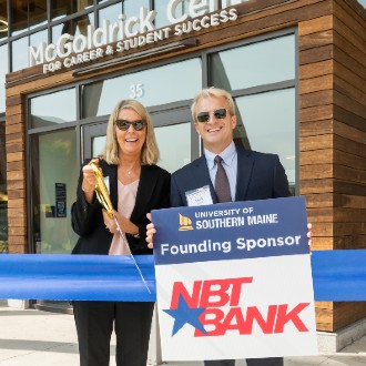 NBT Bank employees (left) Kimberly Twitchell, Senior Director of Affordable Housing, and (right) Mark Schaub, Vice President, Senior Commercial Banking Relationship Manager, at the McGoldrick Center for Career & Student Success ribbon cutting on September 27, 2023