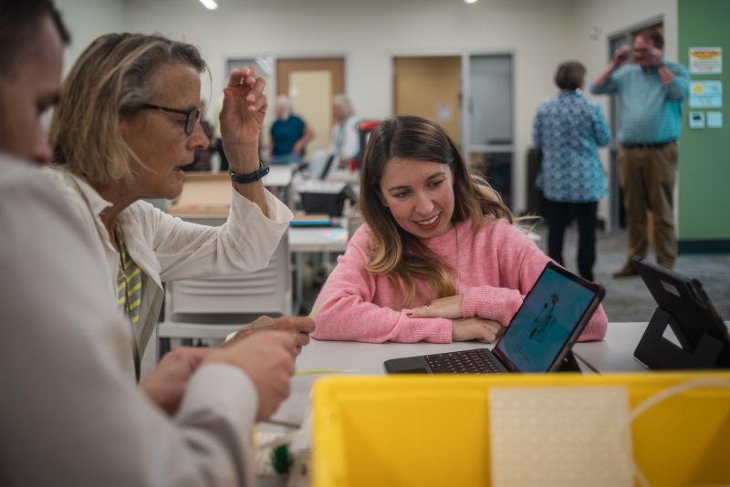 people working together in the collaborative space