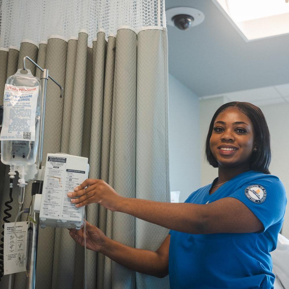 Nursing students at USM help patients while learning in hands-on situations.