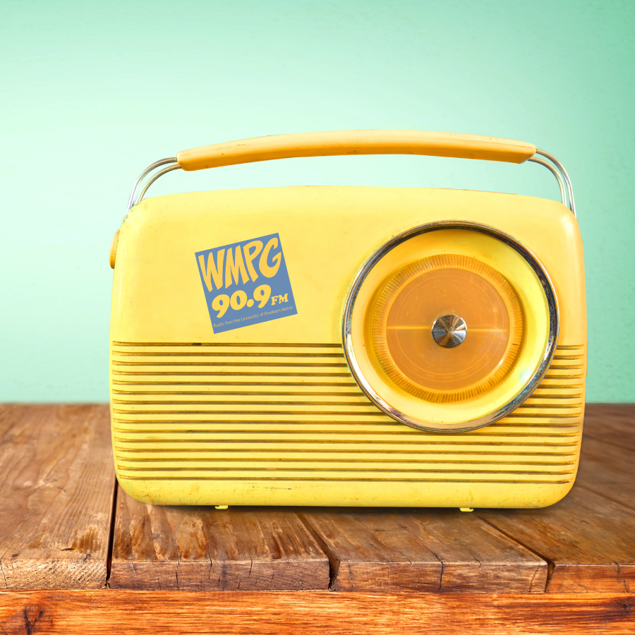 an old fashioned radio with a WMPG radio sticker
