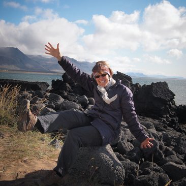 Photo of Rebecca Goodale on Rocks by the sea in Iceland