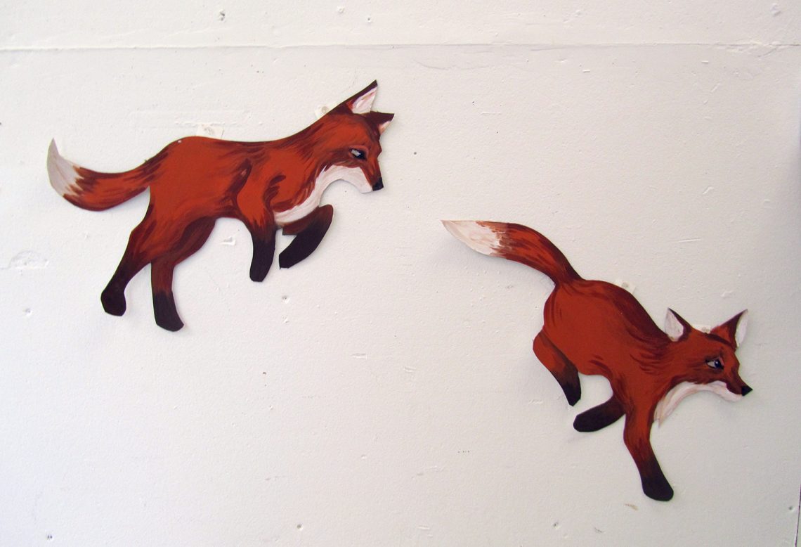 Cutout paintings by student in ART 261