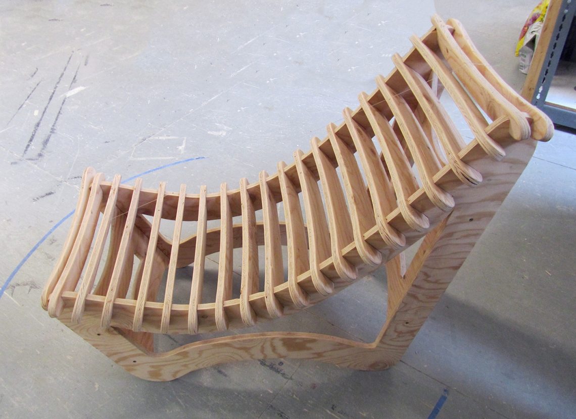 Wooden chair sculpture by Owen Lynch