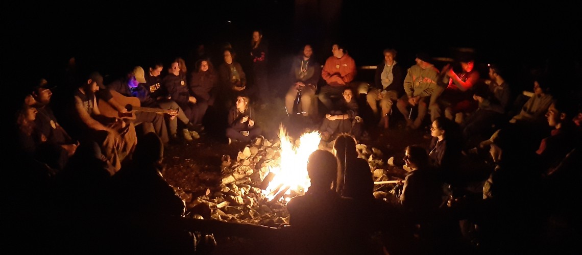students around the campfire