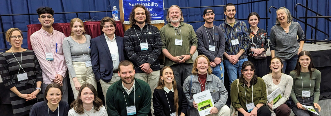 faculty and students at conference