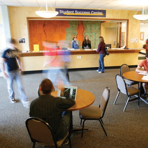 Students hanging out in the student success center on campus
