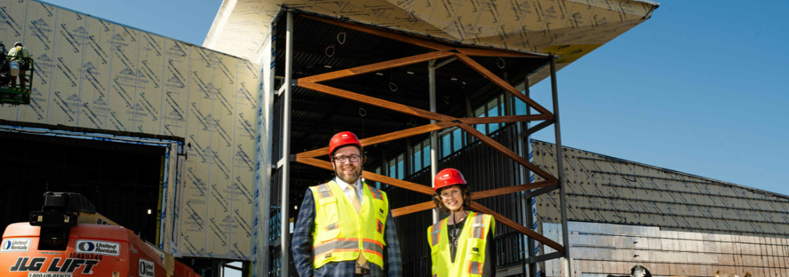 Dr. Kyle Nielsen, Director of the Osher School of Music and Head of Choral Activities, and Kelly Hrenko, Professor of Art, Associate Dean, College of Arts, Humanities, and Social Sciences on site of the new Crewe Center for the Arts