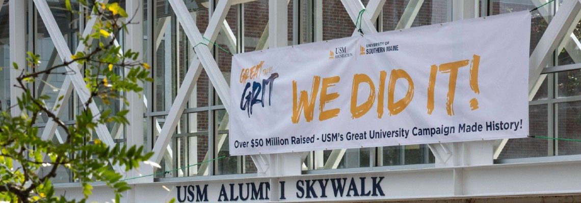 Great University Campaign banner on alumni skywalk