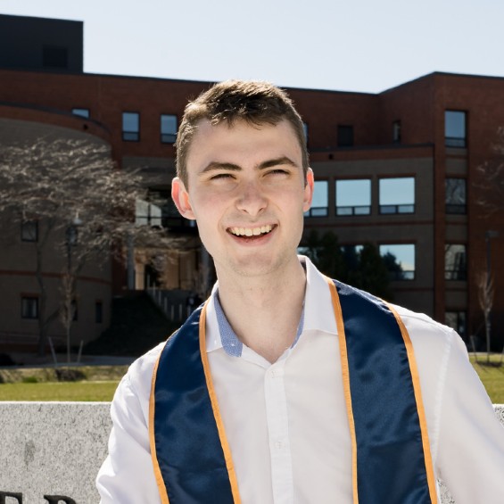 Promise Scholar Jacob Curtis '24 in front of the McGoldrick Center