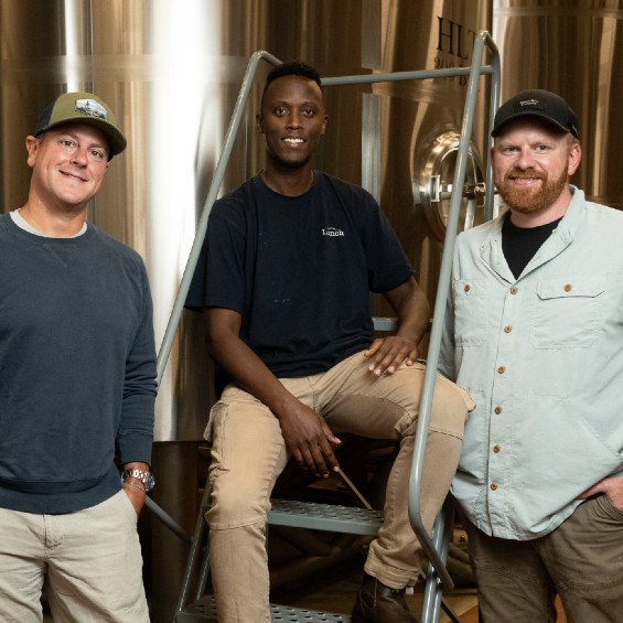 On site at Maine Brewing, Dan Kleban '04, Billy Kwizera, andJonathan Kallock