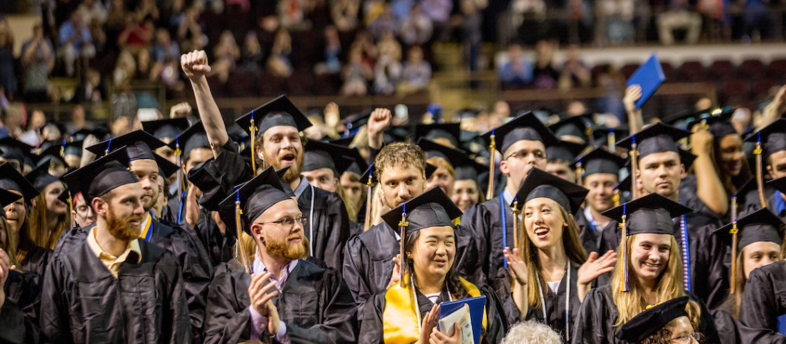 USM grads in caps and gowns