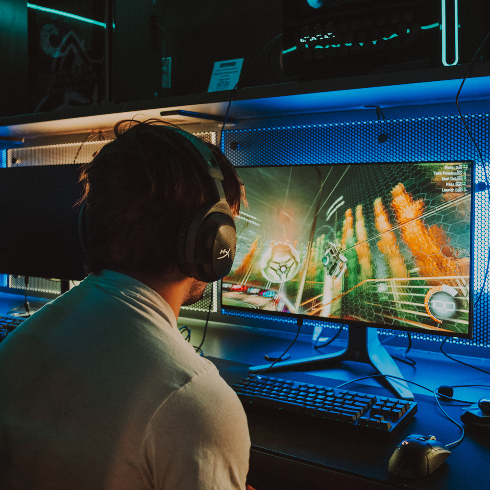 Esports gamer competing in the Collab: Esports Arena space