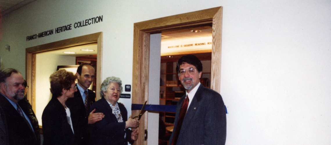 Color image of the ribbon cutting at the new Collection location in 2001.