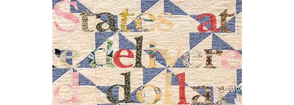 An image of a quilt with letters on it in different fabrics. They y read "States at deliver dollar"