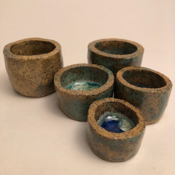 Haley Nelson, "Pinch pots," 2022. Clay and melted sea glass. 1-2 1/2 in. wide x 1-2 1/2 in. long x 1-2 1/2 in. deep