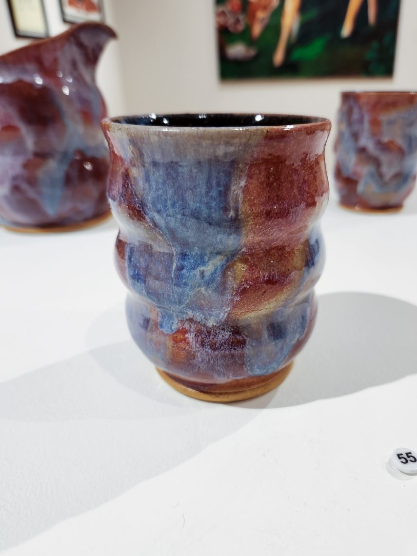 Annika Soderberg "Daydream Cup I" 2023. Stoneware, 3 1/2in. long x 3 1/2in. wide x 4in high. Part of the "2023 Bachelor of Fine Arts and Bachelor of Arts Exhibition," University of Southern Maine Art Gallery.