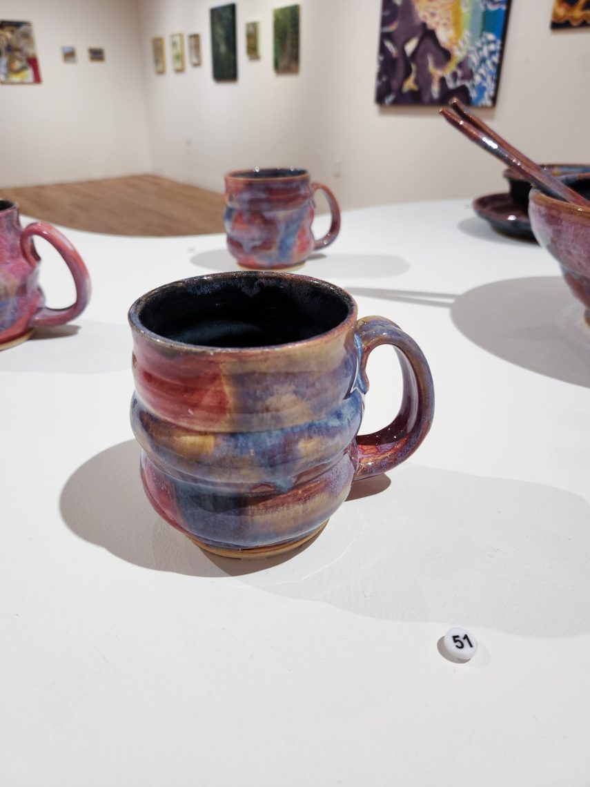 Annika Soderberg "Daydream Mug I" 2023. Stoneware, 5 1/2in. long x 4in. wide x 4in high. Part of the "2023 Bachelor of Fine Arts and Bachelor of Arts Exhibition," University of Southern Maine Art Gallery.