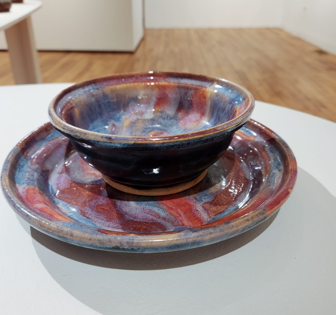 Annika Soderberg "Koi Pond Plate" 2023. Stoneware, 9in. long x 9in. wide x 1 1/4in deep. 

'Koi Pond Bowl" 2023. Stoneware, 6in long x 6in wide x 2 1/2 in deep.Part of the "2023 Bachelor of Fine Arts and Bachelor of Arts Exhibition," University of Southern Maine Art Gallery.